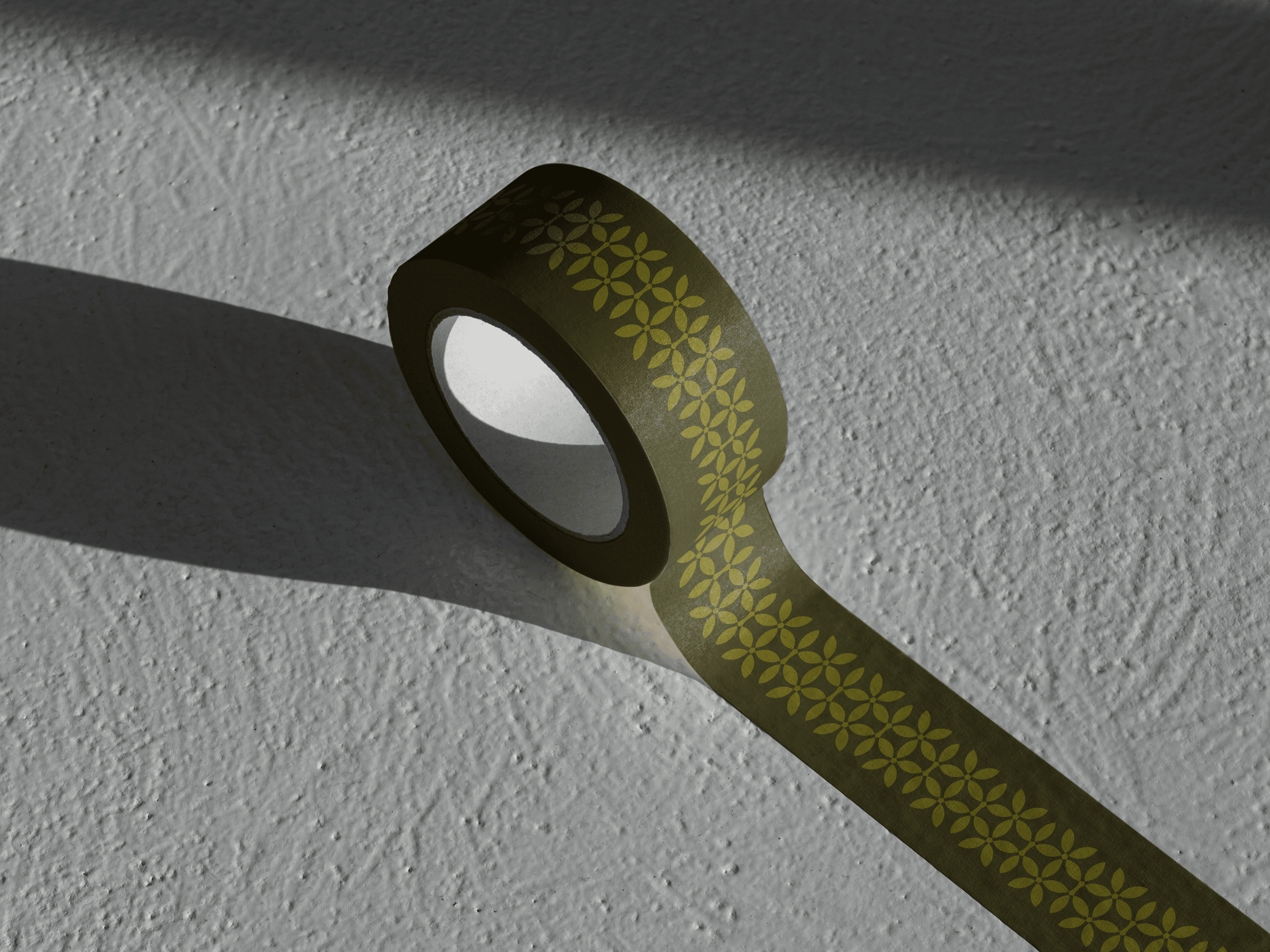 Roll of olive Artisan GF Co. packing tape printed with the brand pattern